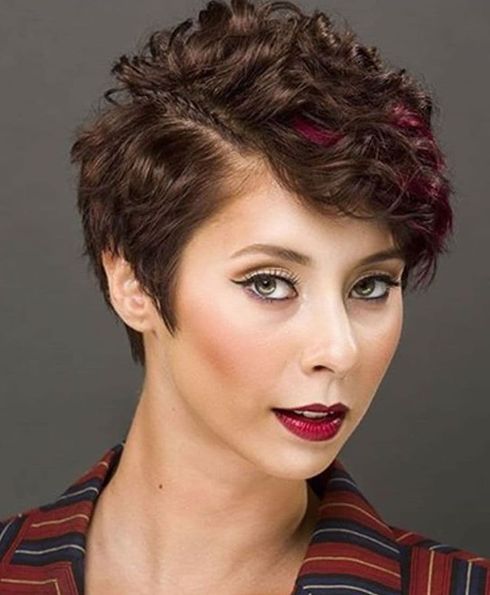 Side swept curly pixie haircut 2023
