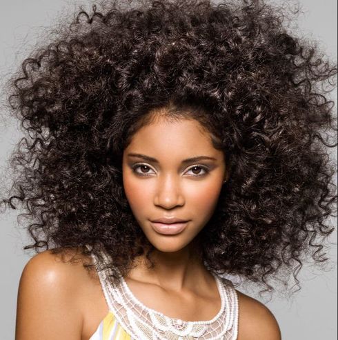 Extra voluminous curly hair for black women with triangle face