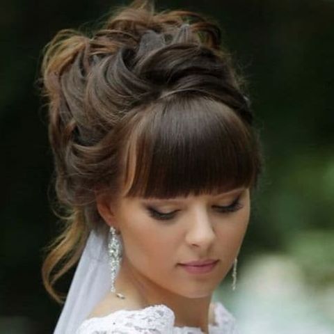 Bun wedding hair with bangs 2021-2022