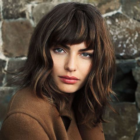 Brown balayage wavy hair with bangs for women in 2021-2022
