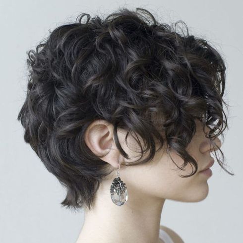 Curly pixie haircut with bangs 2023
