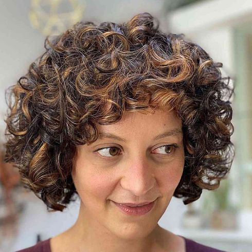 Can I add extensions to my curly short bob for more length?