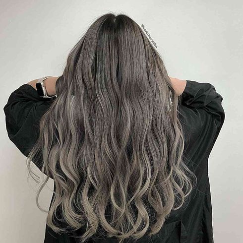 Smokey Dark Hair with Subtle Blonde Highlights