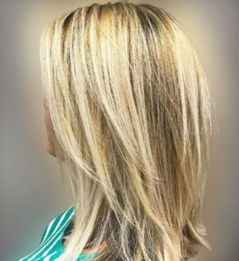 Blonde layered mid-length hairstyle