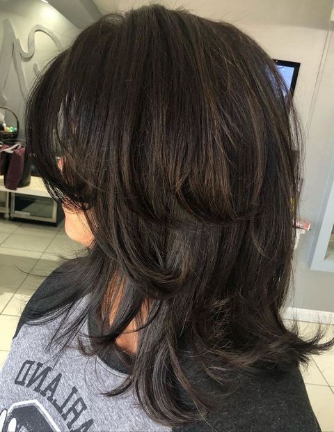 Layered haircut with swoopy layers
