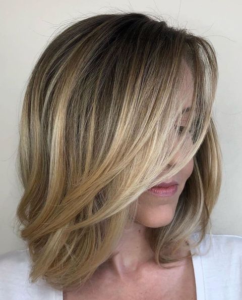 Medium blonde cut with layers