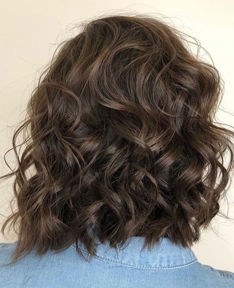 Tousled neck length haircut