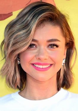 Wavy short bob hairstyle with brown balayage hair color