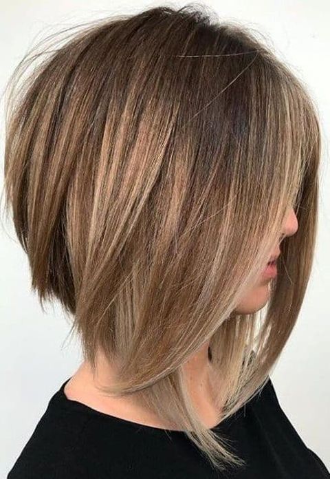 Asymmetrical short bob haircut brown hair color