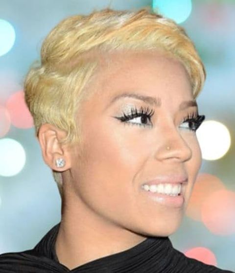 Side swept blonde pixie hair style for black women