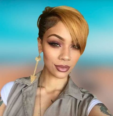 Undercut pixie haircut with long bangs for black women