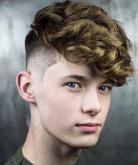 Curly undercut short hair for teenage guys in 2021-2022