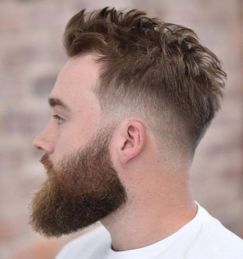 Curly low fade with beard for men in 2021-2022