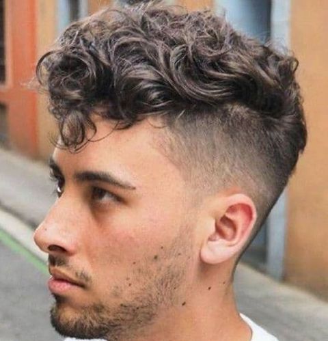 High fade curly short haircut for men in 2021-2022