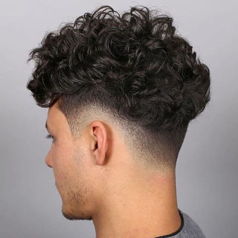 Pompadour short curly style for men in 2021-2022
