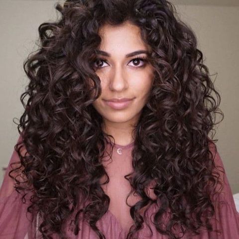 Voluminous curly long hair for oval face 2021-2022