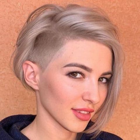 Side undercut short bob with long bangs for women in 2021-2022