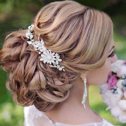 Low bun wedding hairstyle 2021-2022