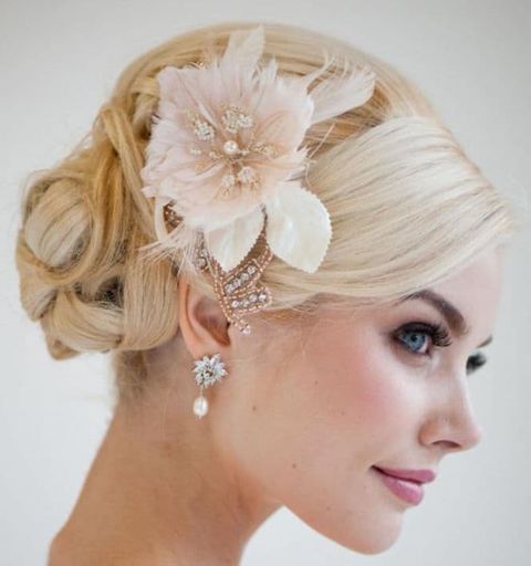 Wedding bun hair style with flowers 2021-2022