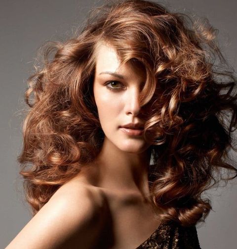 Voluminous wavy long hair style for women in 2021-2022