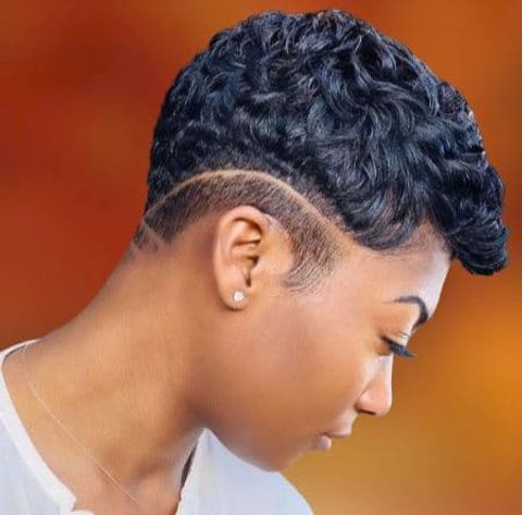 Curly natural undercut pixie hairstyle for black women