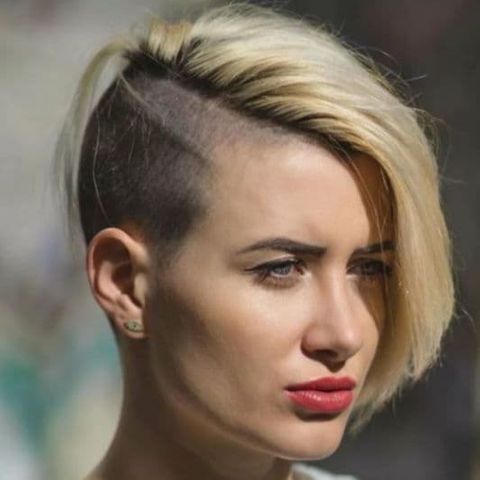 Side swept undercut short hair with long bangs for women in 2021-2022