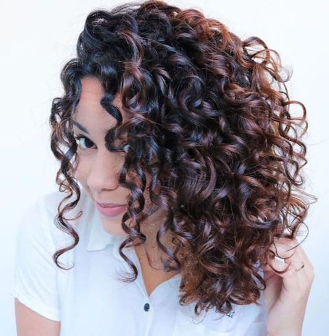 Black-brown balayage curly long hair styles for women in 2021-2022