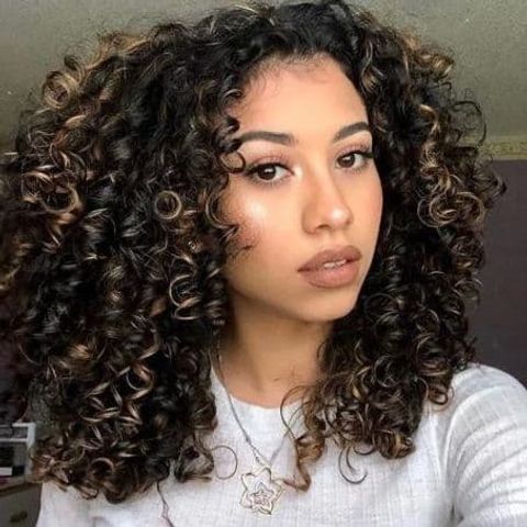 Brown balayage voluminous long curly hair for black women in 2021-2022