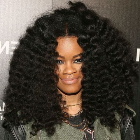 Voluminous long curly hairstyle for black women in 2021-2022