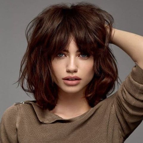 Wavy hair with bangs for women in 2021-2022