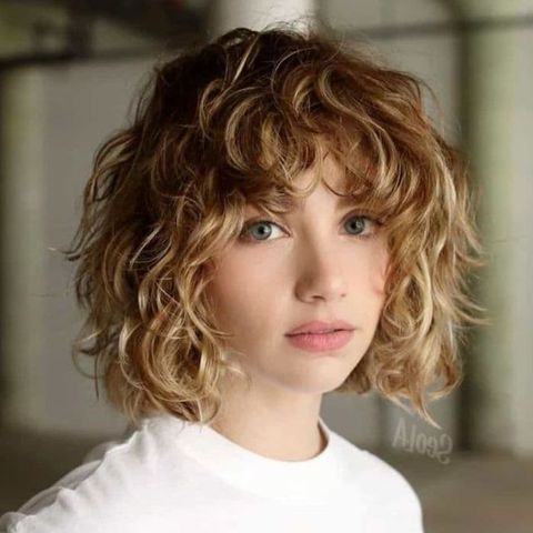 Curly haircuts with bangs for teenage girls in 2021-2022