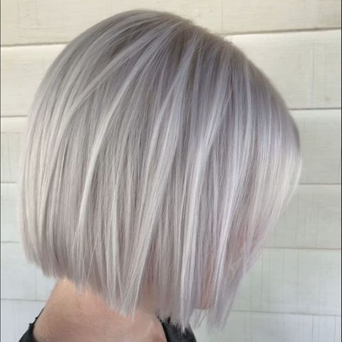 Layered platinum blonde bob cut in 2021-2022