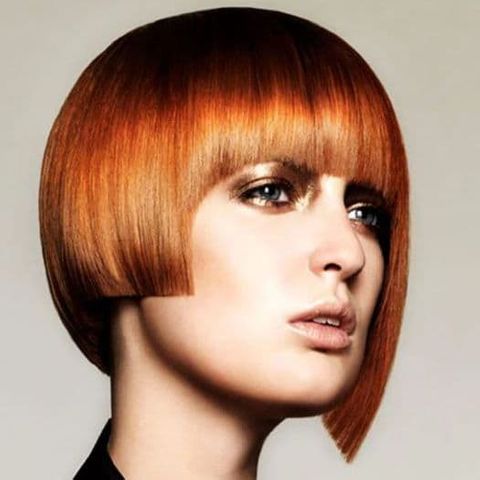 Red ombre blunt asymmetrical bob cut with bangs