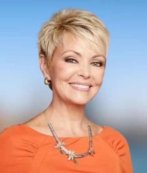 Blonde hair color layered short pixie for women over 60