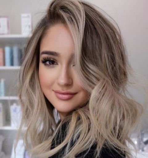 Mid-length hair with light blonde highlights in 2021-2022