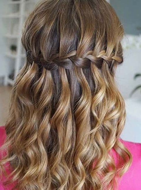 Low waterfall braid with wavy hair for girls 2021-2022