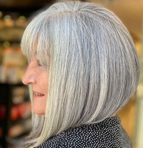 Asymmetrical short bob haircut for women over 60 in 2021-2022
