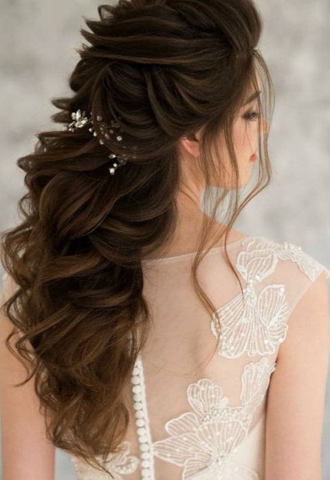 Wide wavy wedding hairstyle in 2021-2022