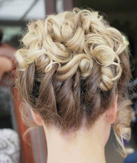 Blonde curly prom hairstyle in 2021-2022