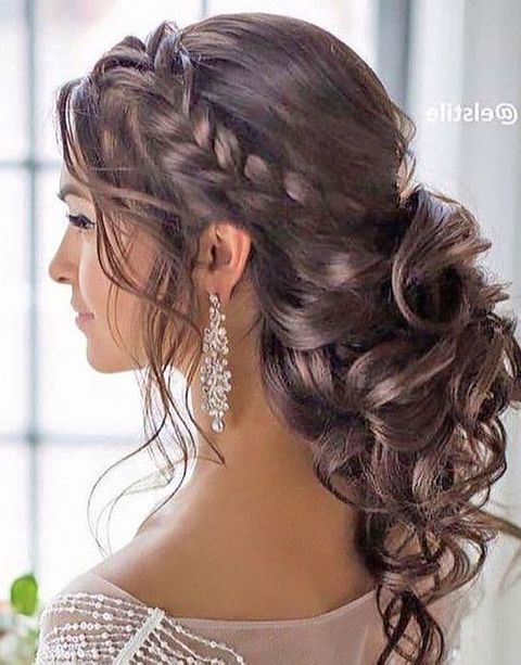 Braids low ponytail prom hairstyle in 2021-2022