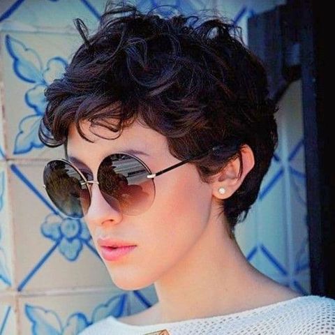 Wavy short haircut for women with glasses in 2021-2022