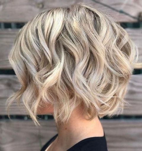 Wavy blonde balayage short bob