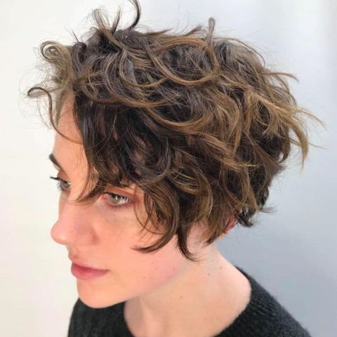 Curly asymmetrical pixie cut