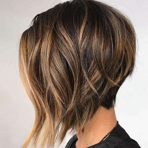 Asymmetrical short haircut with brown ombre