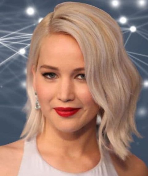 Jennifer Lawrence's wavy long bob with platinum blonde hair color