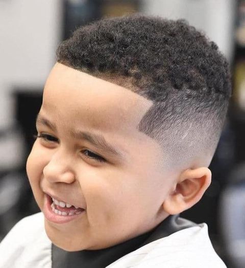 Edgar haircut with curly hair
