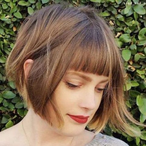 Asymmetrical short hair with bangs