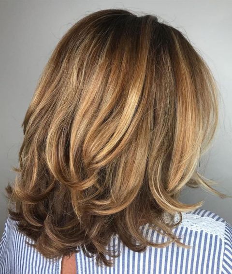 Brown color layered mid-length hair