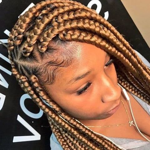 Side parted jumbo box braids