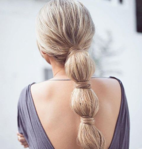 Low ponytail knotted long hair